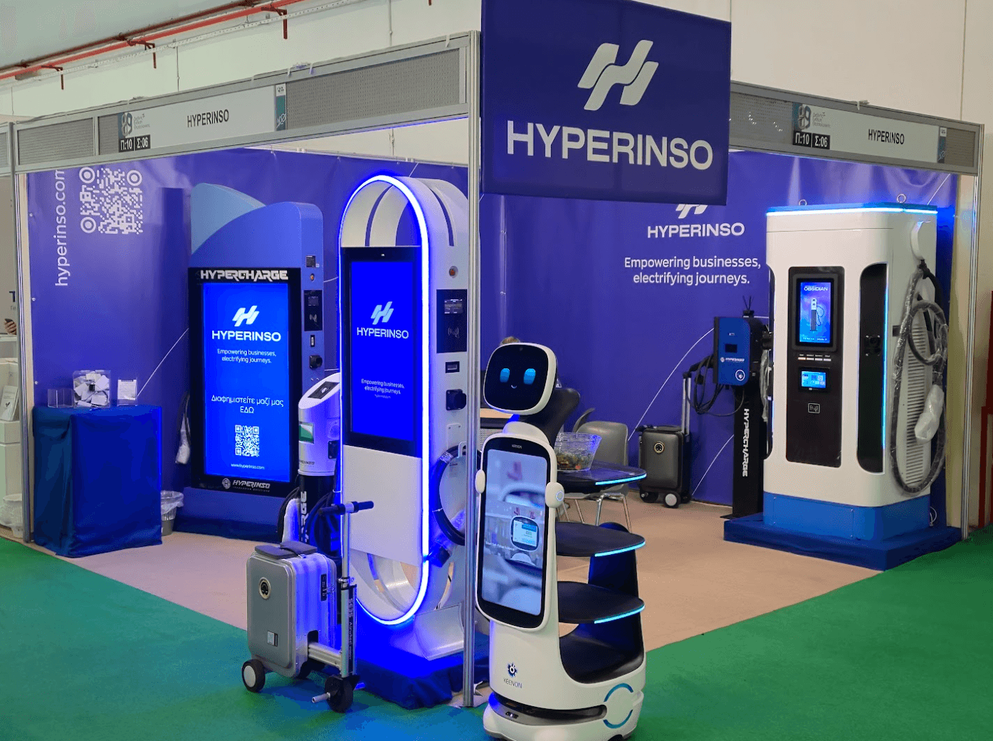 The Hyperinso stand at the 89th TIF, with chargers, digital displays and service robots